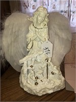 Collectible angel with nativity