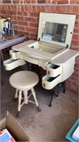 Vanity converted from antique sewing machine table