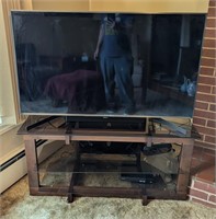 Flat Screen tv and stand 43" by 25"