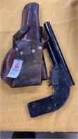 Leather pistol case, toy gun
