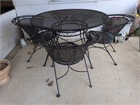 Wrought iron round table and 4 chairs