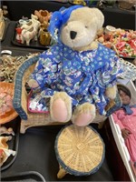 Teddy bear w/ wicker furniture.