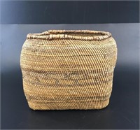 Hand coiled grass basket with woven base, made fro