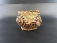 Antique hand coiled basket, likely from Southern o