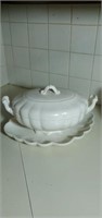Fancy off white colored soup dish