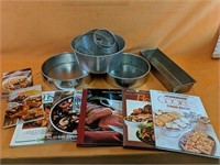 Assorted baking pans 10"-14" with cookbooks