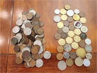 Estate lot of foreign coins and nickels & pennies