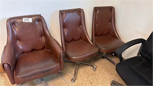 3 Brown "leather" chairs