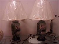 Pair of painted table lamps depicting a heron,