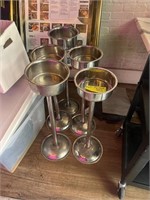 Five champagne bucket stands