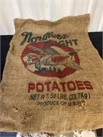 G) vintage potato gunny sack, very nice display