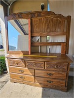 Dresser, mirror, and headboard