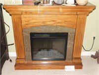 Electric home fire place with Oak surround and