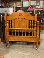 Oak twin bed with rails