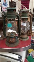 Two Vintage Metal and Glass Storm Lanterns