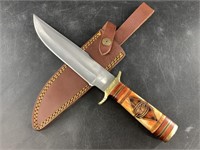 Fixed bladed knife with brass guard and end cap, s