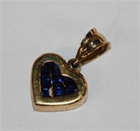 14k yellow gold Blue Sapphire Pendant features