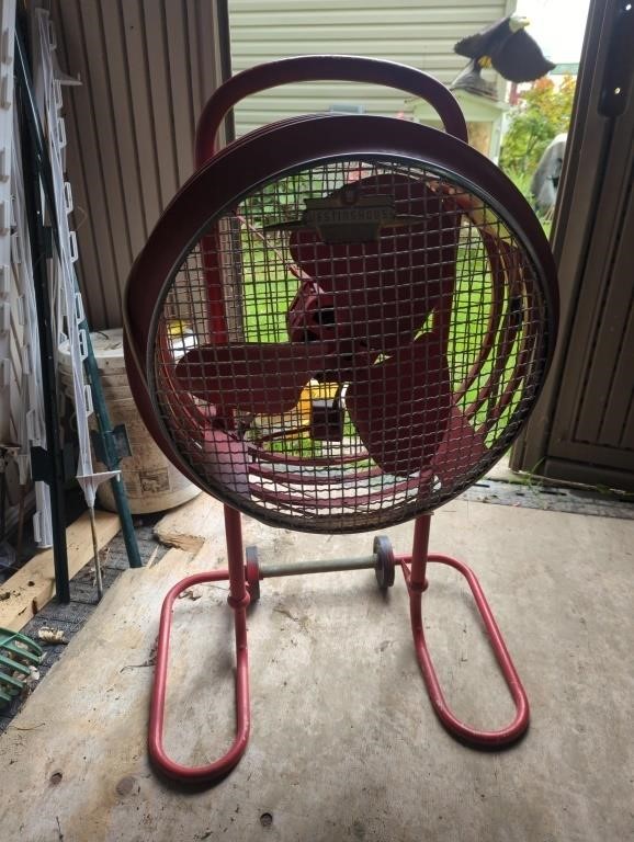 Retro red Westinghouse stand fan
