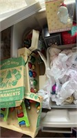 Tote of ornaments and bulbs