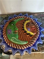 Ceramic moon and Native American sun