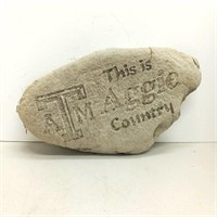 This is Aggie Country garden decor rock