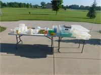 Lot 236  Tupperware and Plastic Storage Bins.