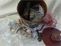 Canister with miscellaneous jewelry