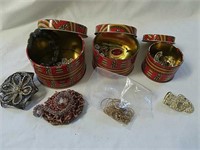 3 tin canisters with miscellaneous jewelry