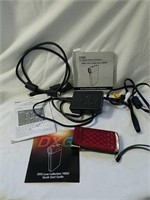 DXG digital camera with manual and cords