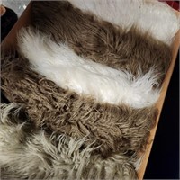 Box of Faux Fur Accent Pillows