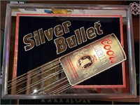 Silver bullet Coors light-up sign.