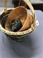 Wicker baskets, one a Longaberger