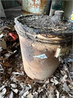 bucket of oil of some kind