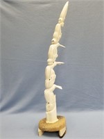 Walrus Ivory carving of assorted marine mammals on