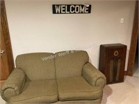 Love seat, Welcome sign, and radio cabinet