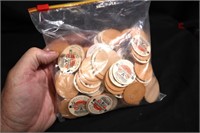 Large bag of cardboard cream bottle tops