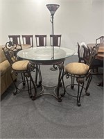 Glass top metal table and two chairs