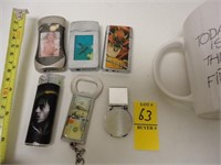 (4) LIGHTERS , BOTTLE OPENER & MONEY CLIP  W/ CUP