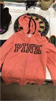 Pink size small zip up hoodie