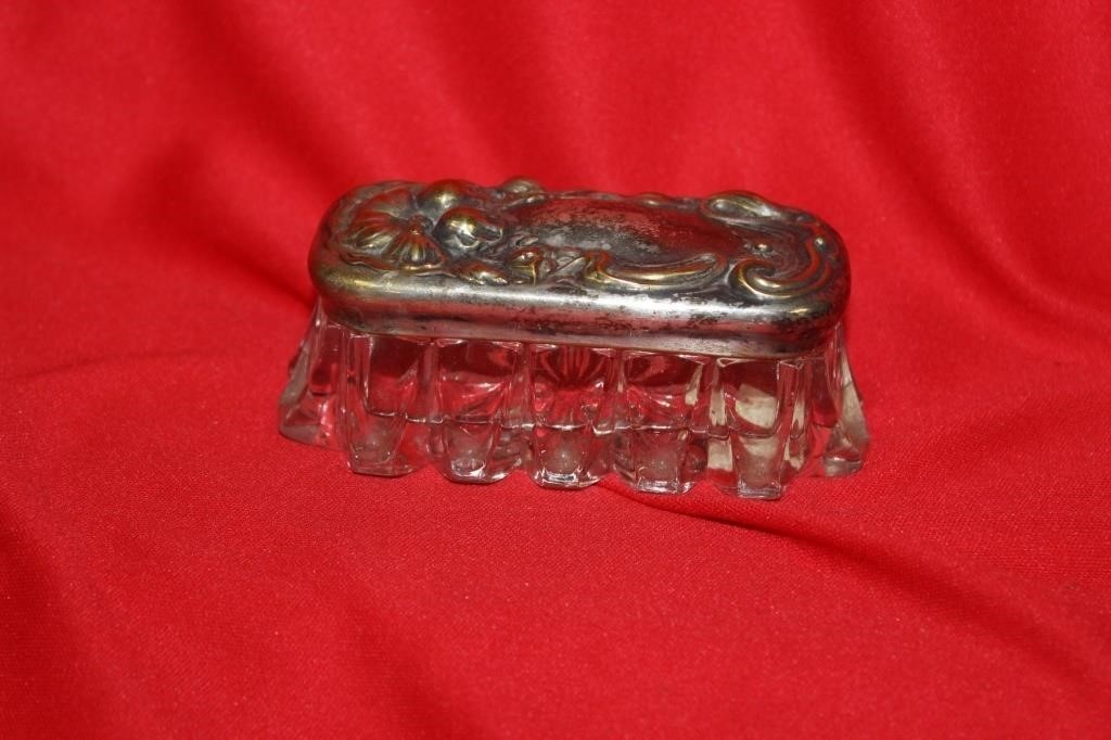 An Ornate Glass Container