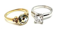 Two 14K Gold Rings w/ Clear Stones.