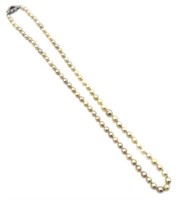 Long Pearl Necklace w/ 14K Diamond & Ruby Clasp.
