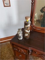 Jars of seashells and rocks