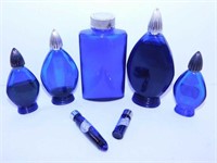 7 Evening In Paris cobalt glass perfume bottles -