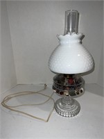 Vintage style lamp filled with buttons