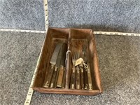 Old Forks and Knives in Wooden Tray