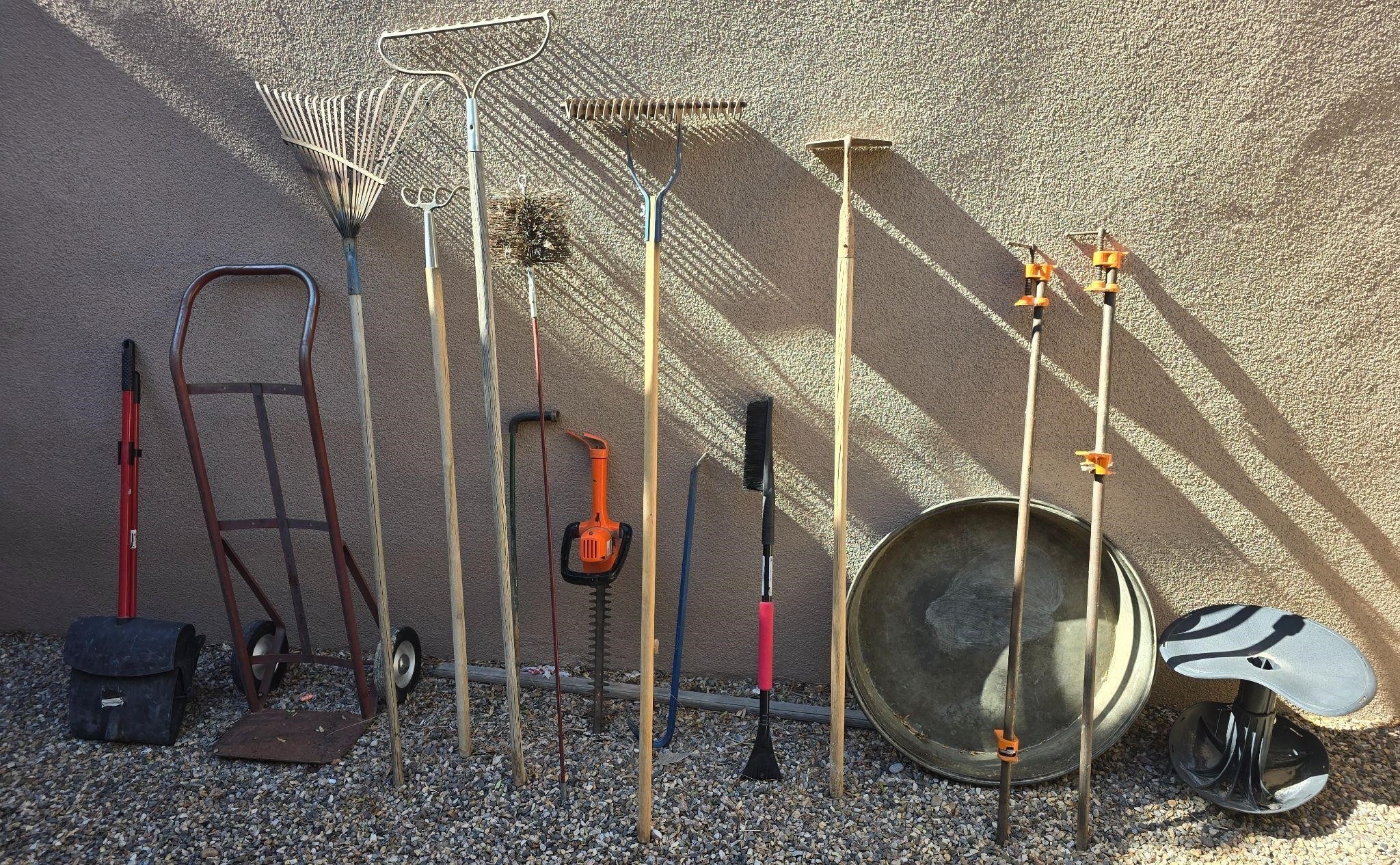 Lot of outdoor yard tools.