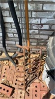 Fire place grate and metal fence post