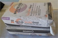 (2) Bags Polyblend sanded grout Platinum.