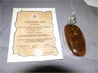 Sterling silver Baltic Amber pendant with COA.